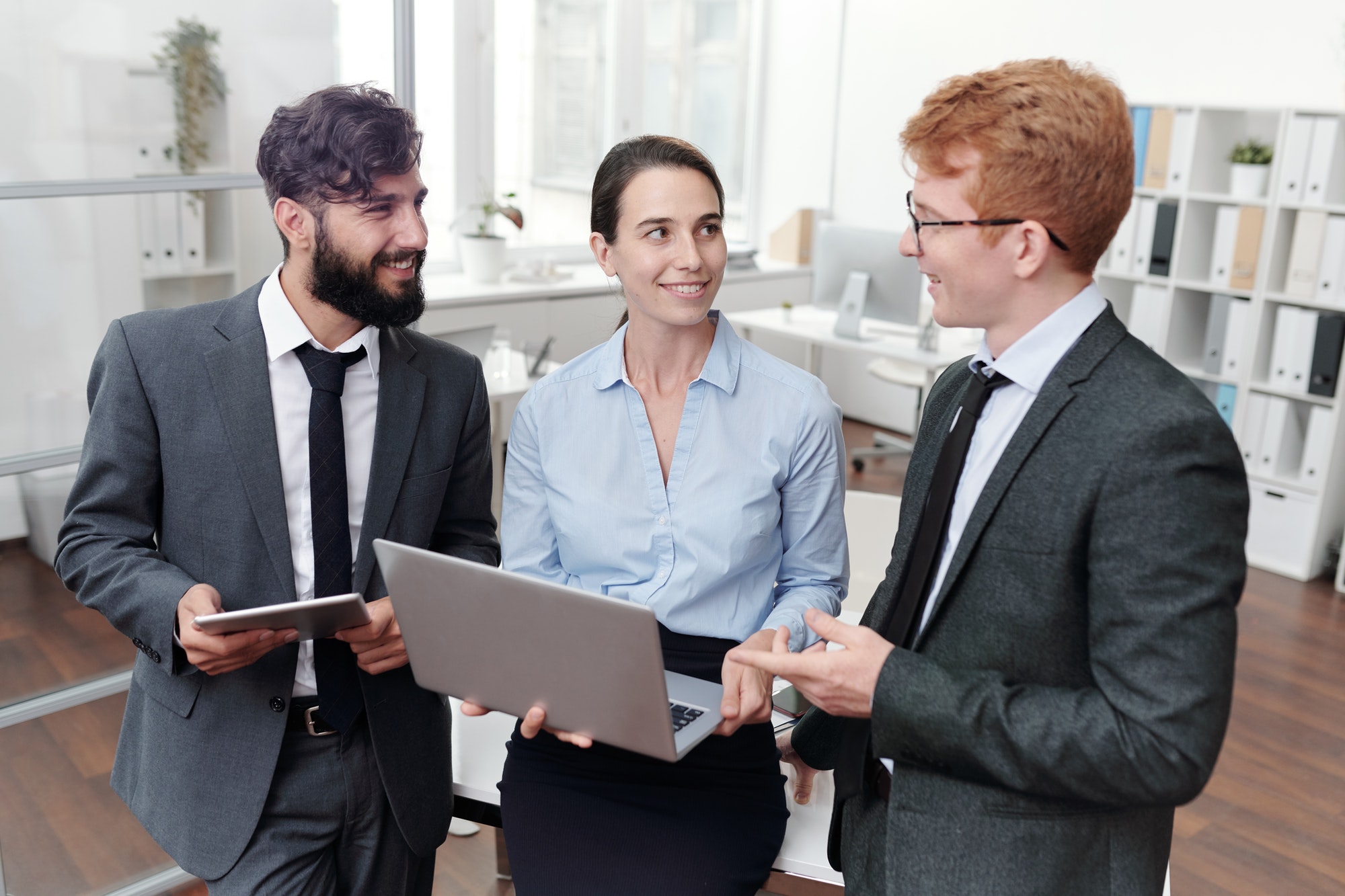 cheerful-business-team-in-office.jpg